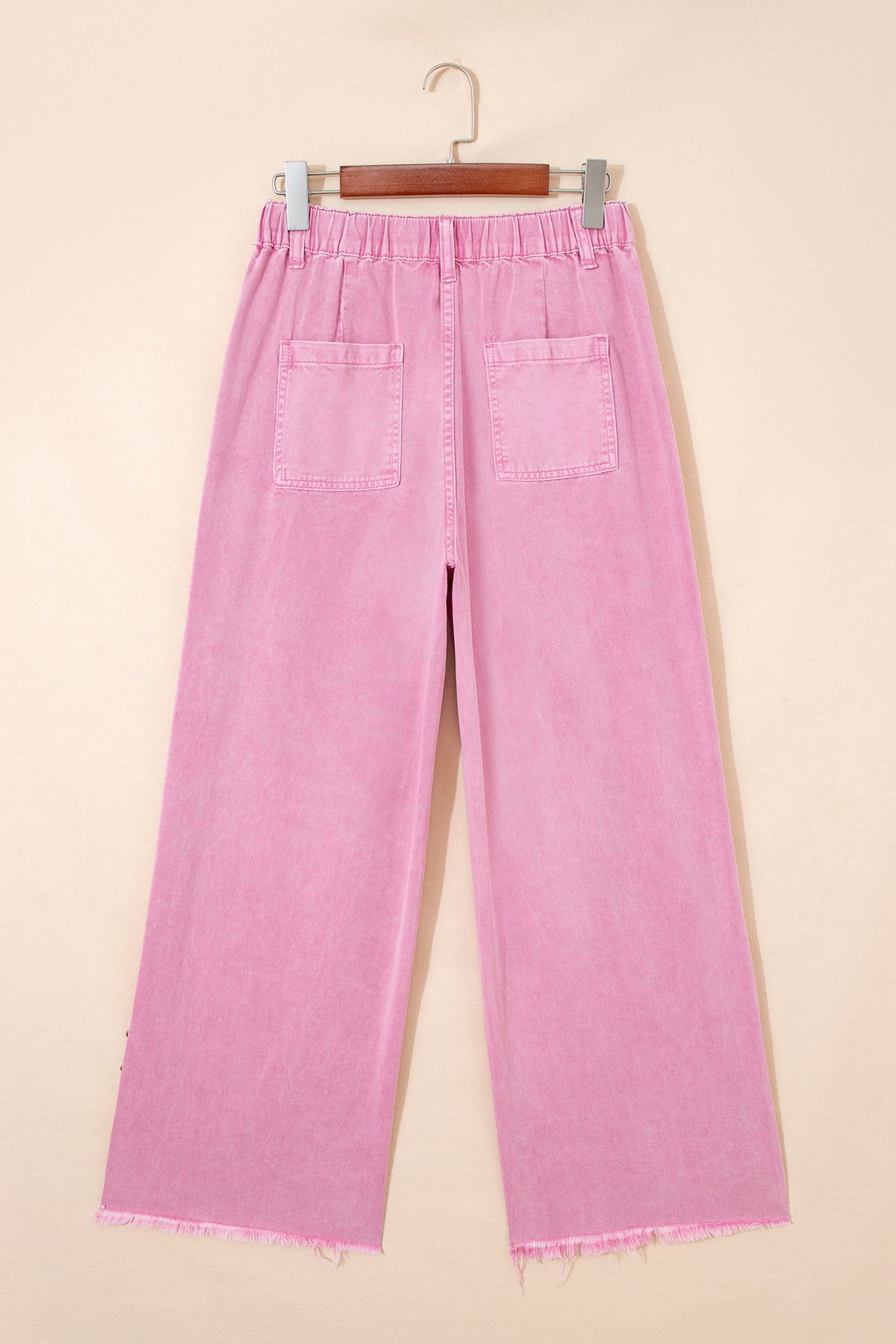 Pink wide leg jeans styled with casual top
