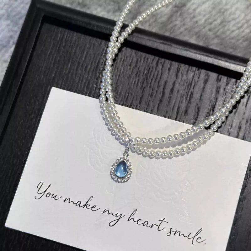 Double layered pearl teardrop pendant necklace front view