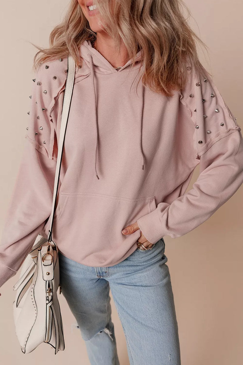 Dusty pink studded shoulder hoodie shown on model