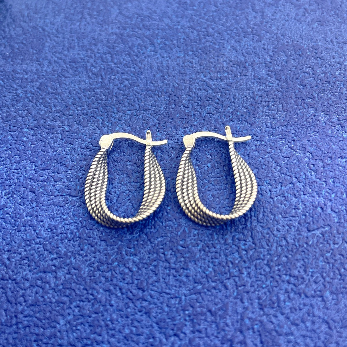 Small silver hoop earrings scale view