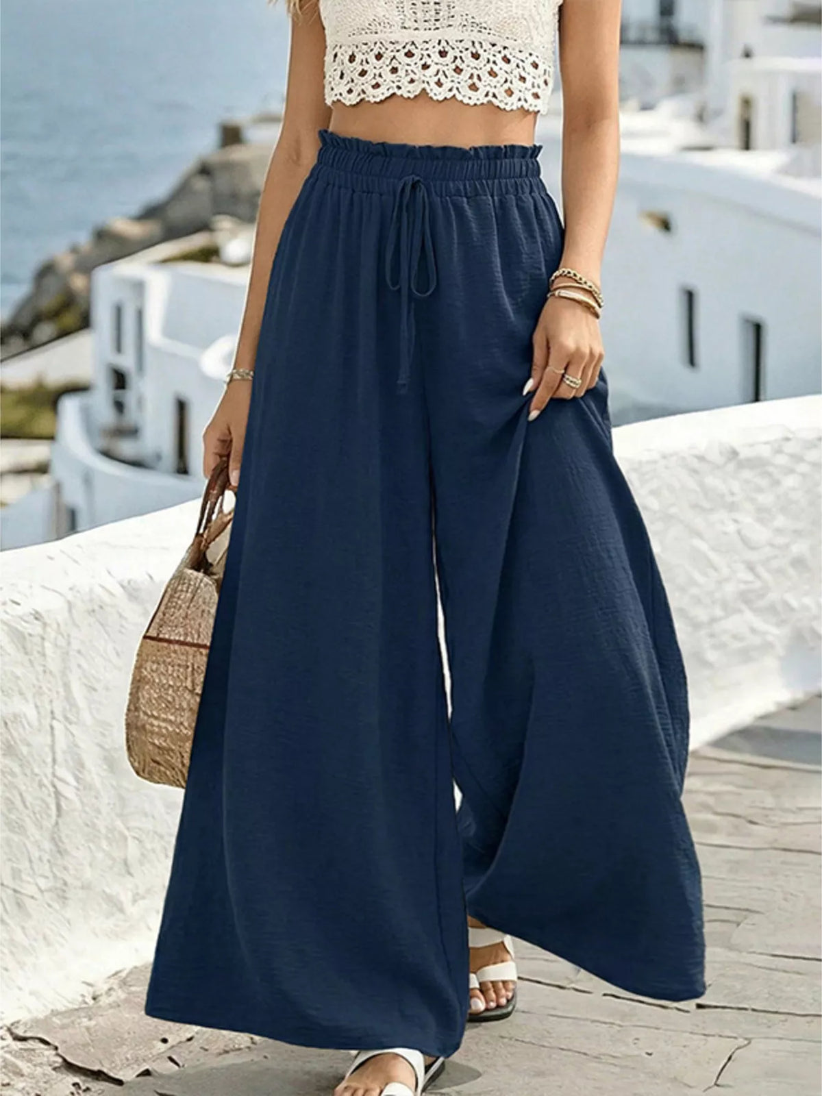 Side view of flowy wide leg trousers
