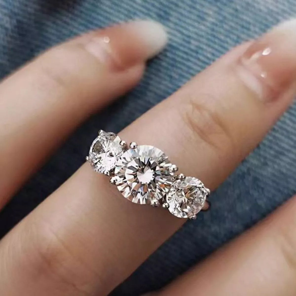 4 carat moissanite ring worn on the hand