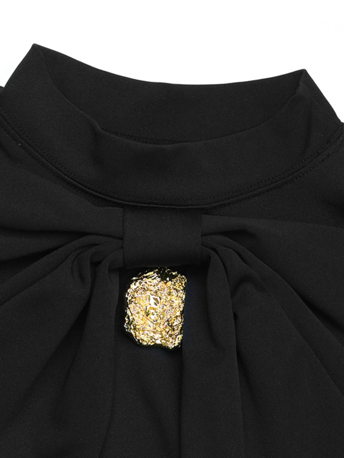 Black button mock neck long sleeve mini dress close up