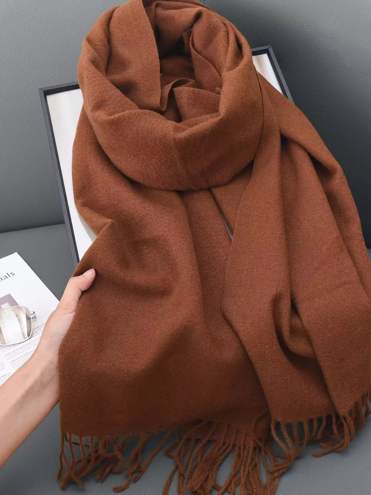 Solid color fringe scarf folded detail