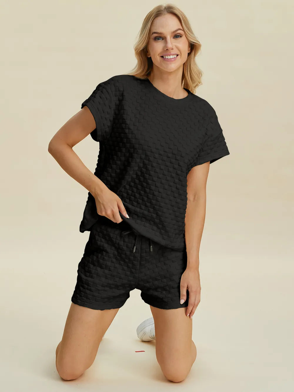 Front body view of the relaxed tee