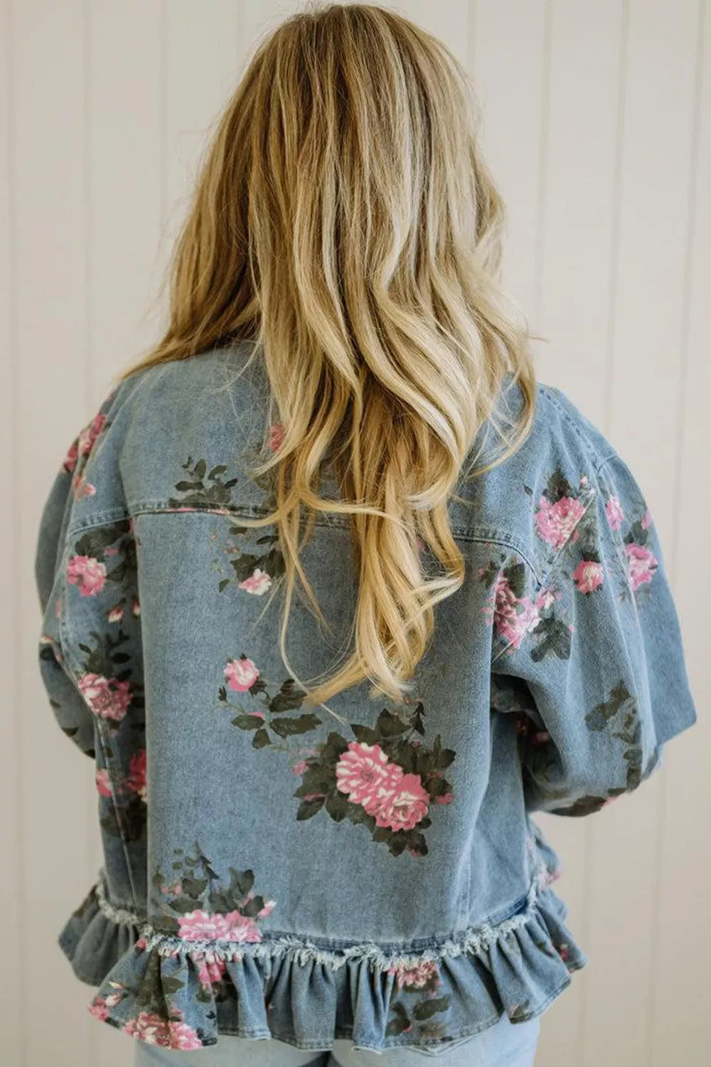 Floral denim jacket shown from the back