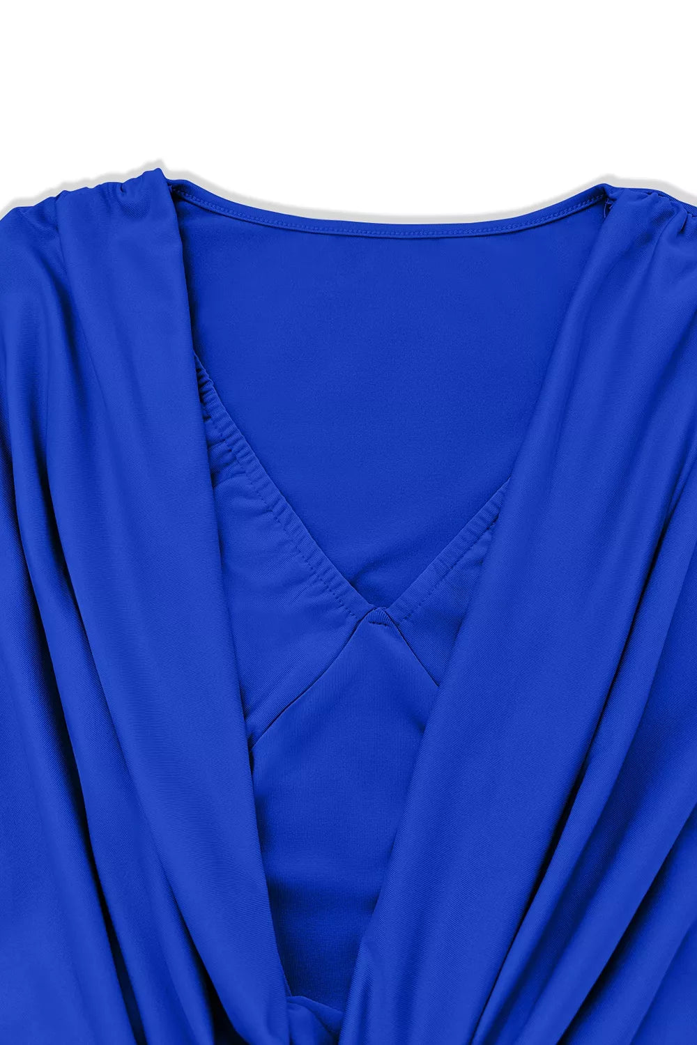 Ruched cowl neck long sleeve mini dress, seated pose