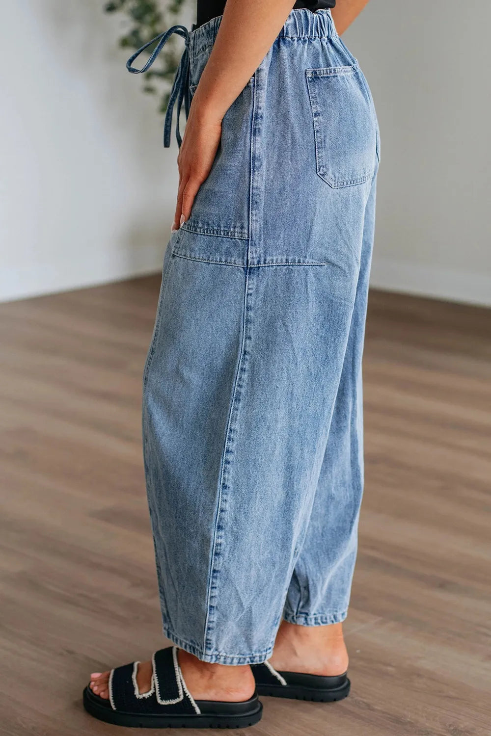 Back view of wide leg drawstring jeans