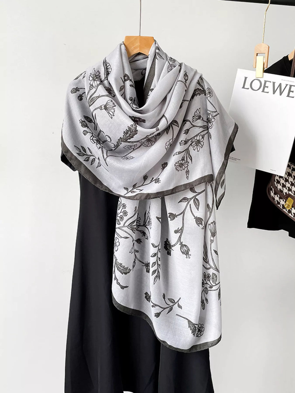 Floral wrap scarf shown in natural light