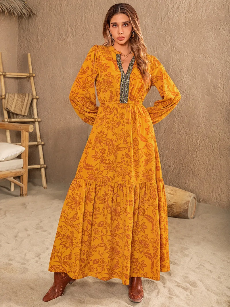 Printed notched balloon sleeve maxi dress in mustard front view