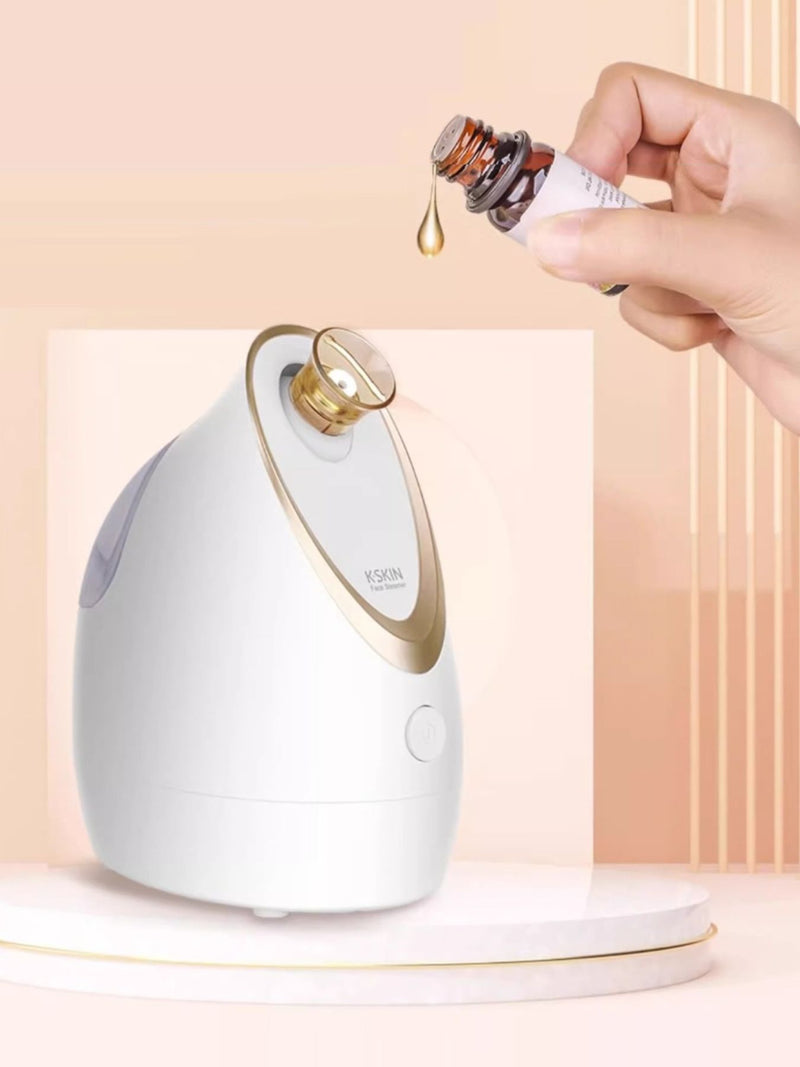 White facial steamer on a vanity