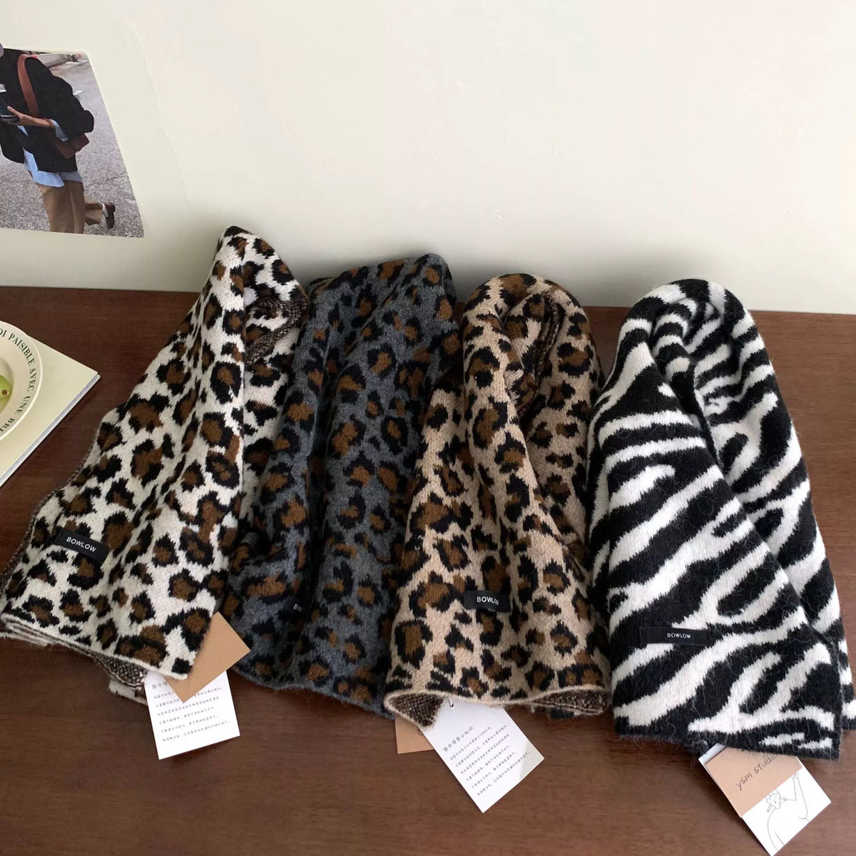 Close view of the animal print on the plush scarf