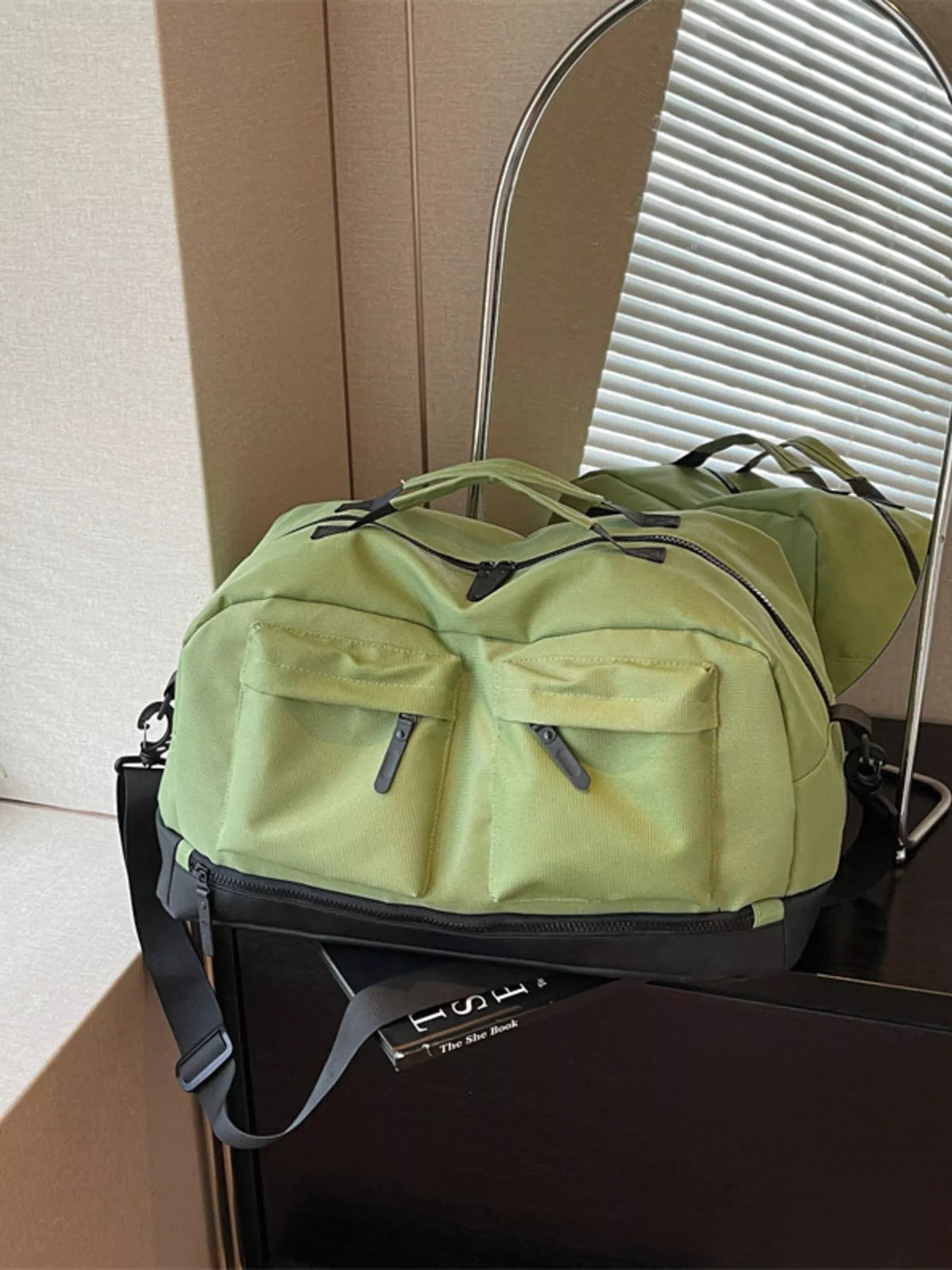 Green multi pocket oxford cloth travel duffel bag front view