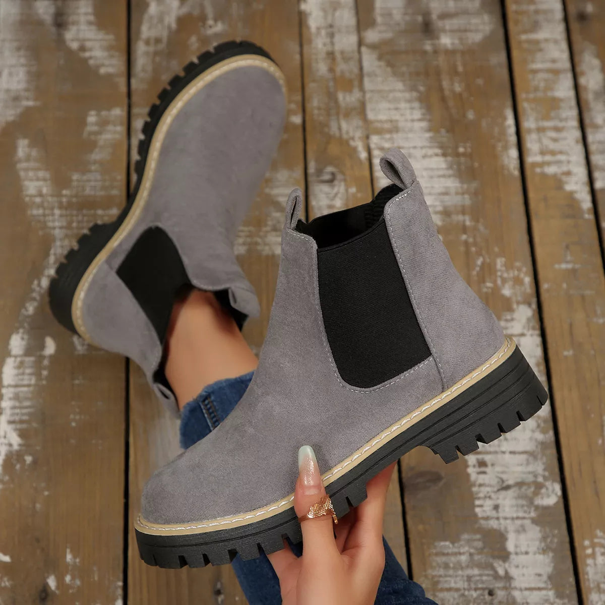 Suede round toe block heel boots upper close up