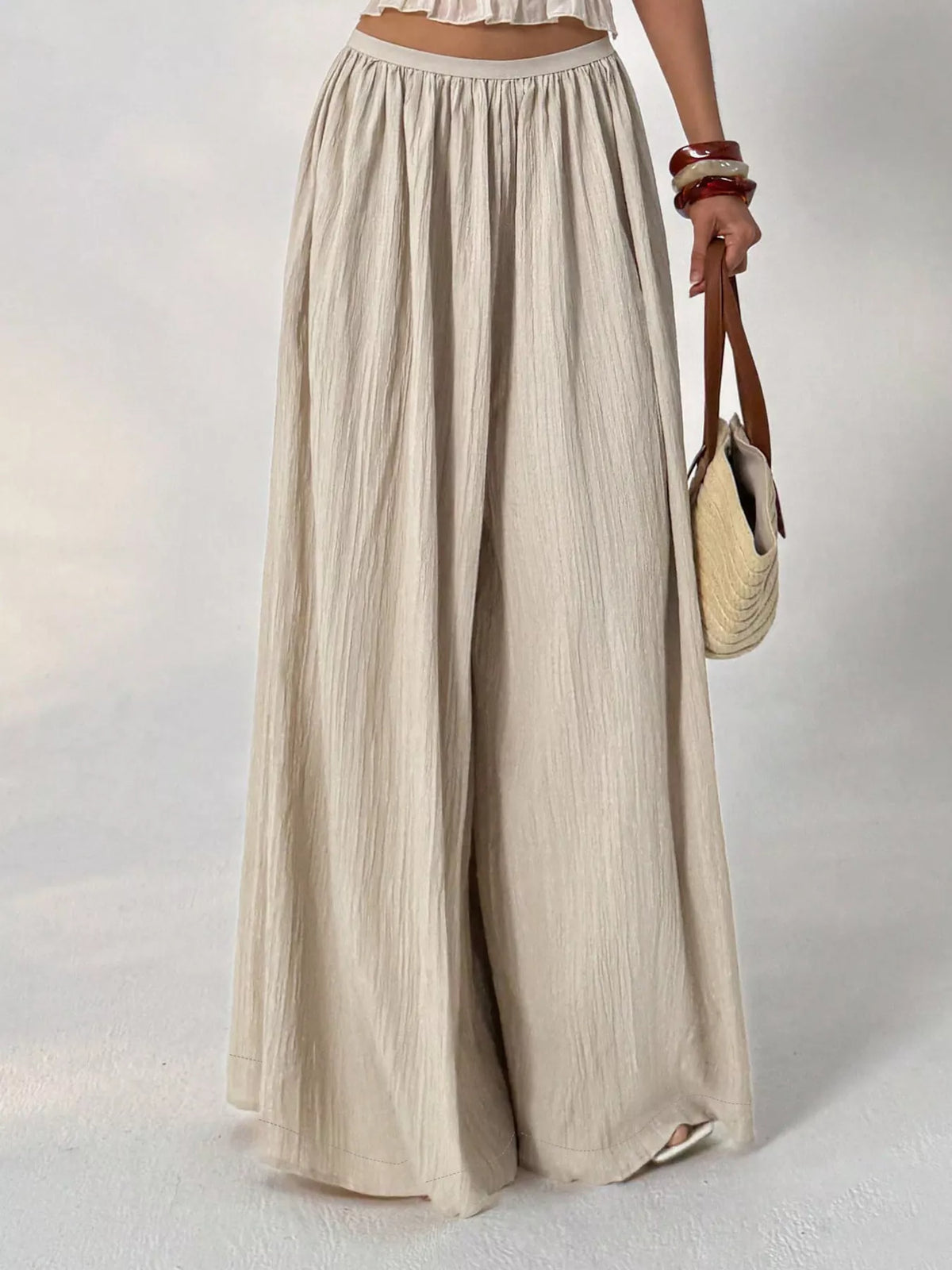Waist detail on the khaki wide leg trousers