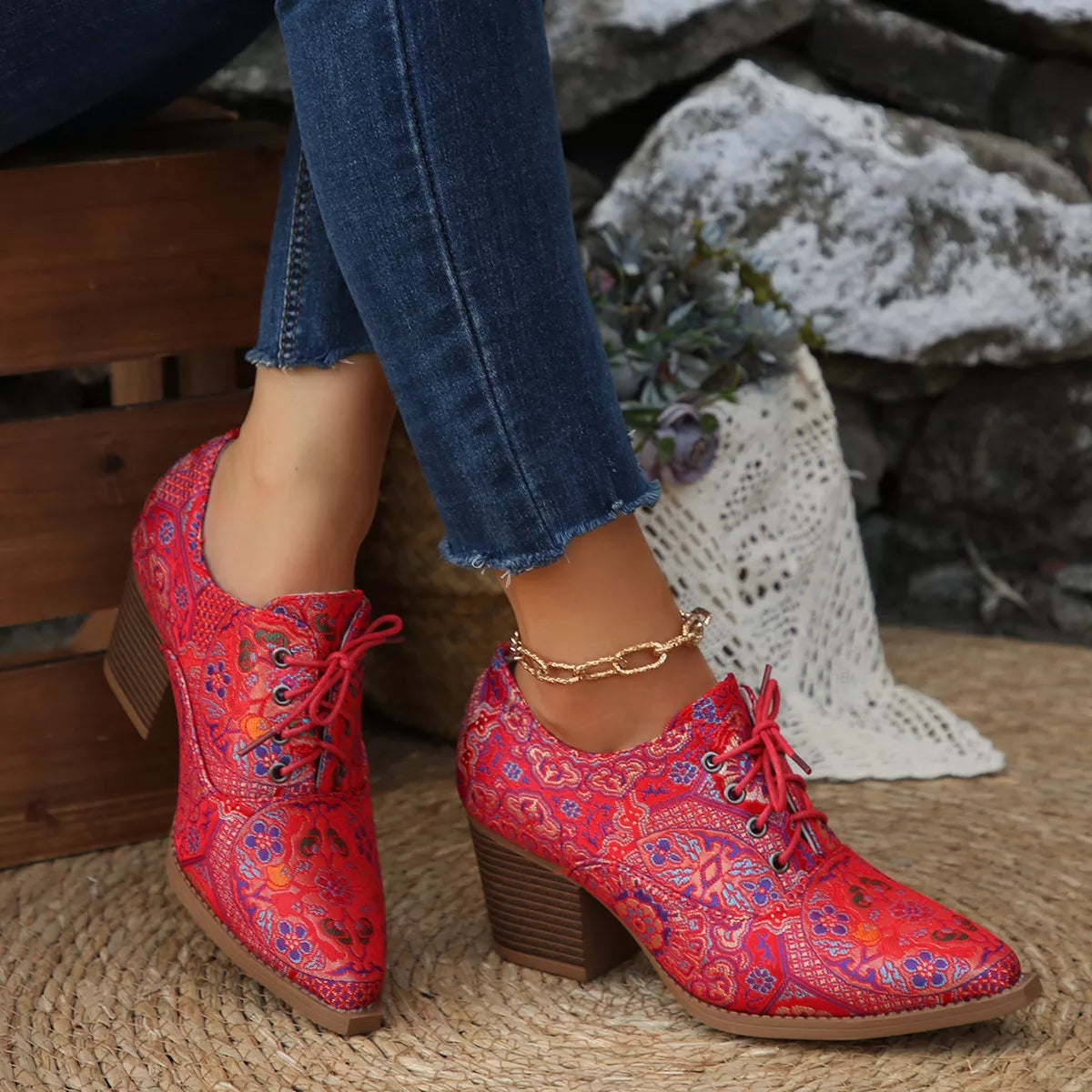 Point toe ankle boots angled studio shot