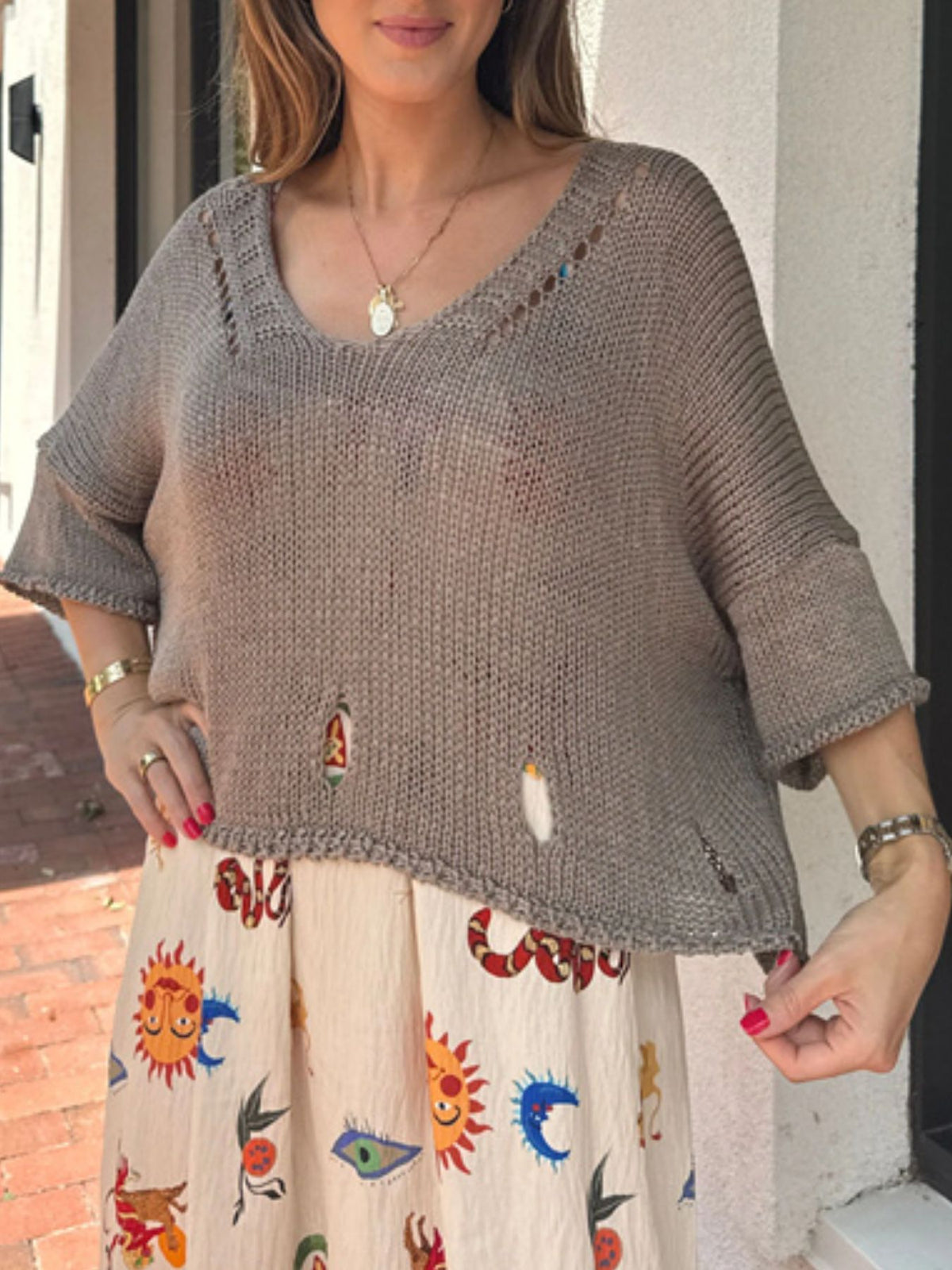 Gray cutout sweater distressed detail styling
