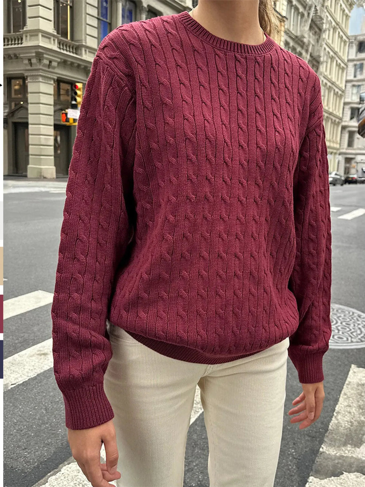 Cable knit round neck pullover sweater front view