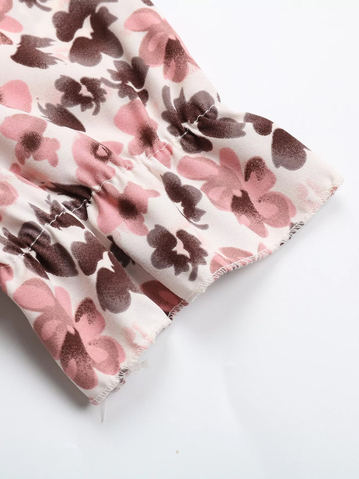 Pink floral tie neck ruffle blouse full length view