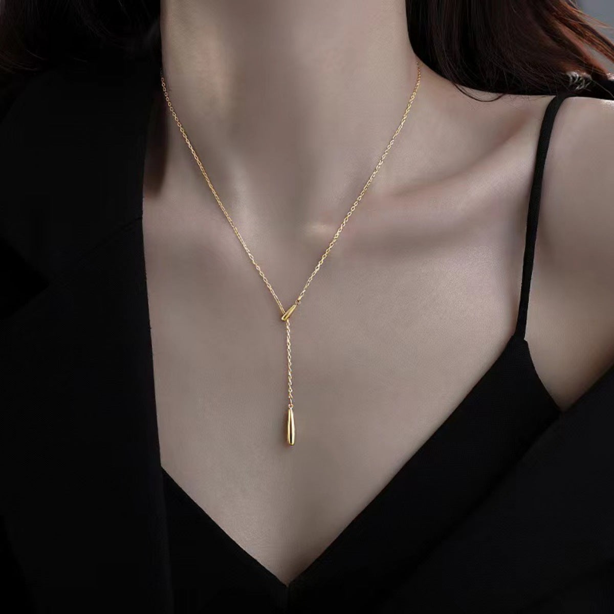 Sterling silver Y pendant necklace worn at the neckline