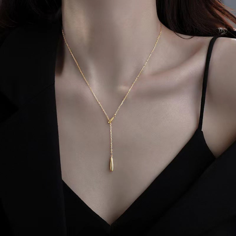 Sterling silver Y pendant necklace worn at the neckline