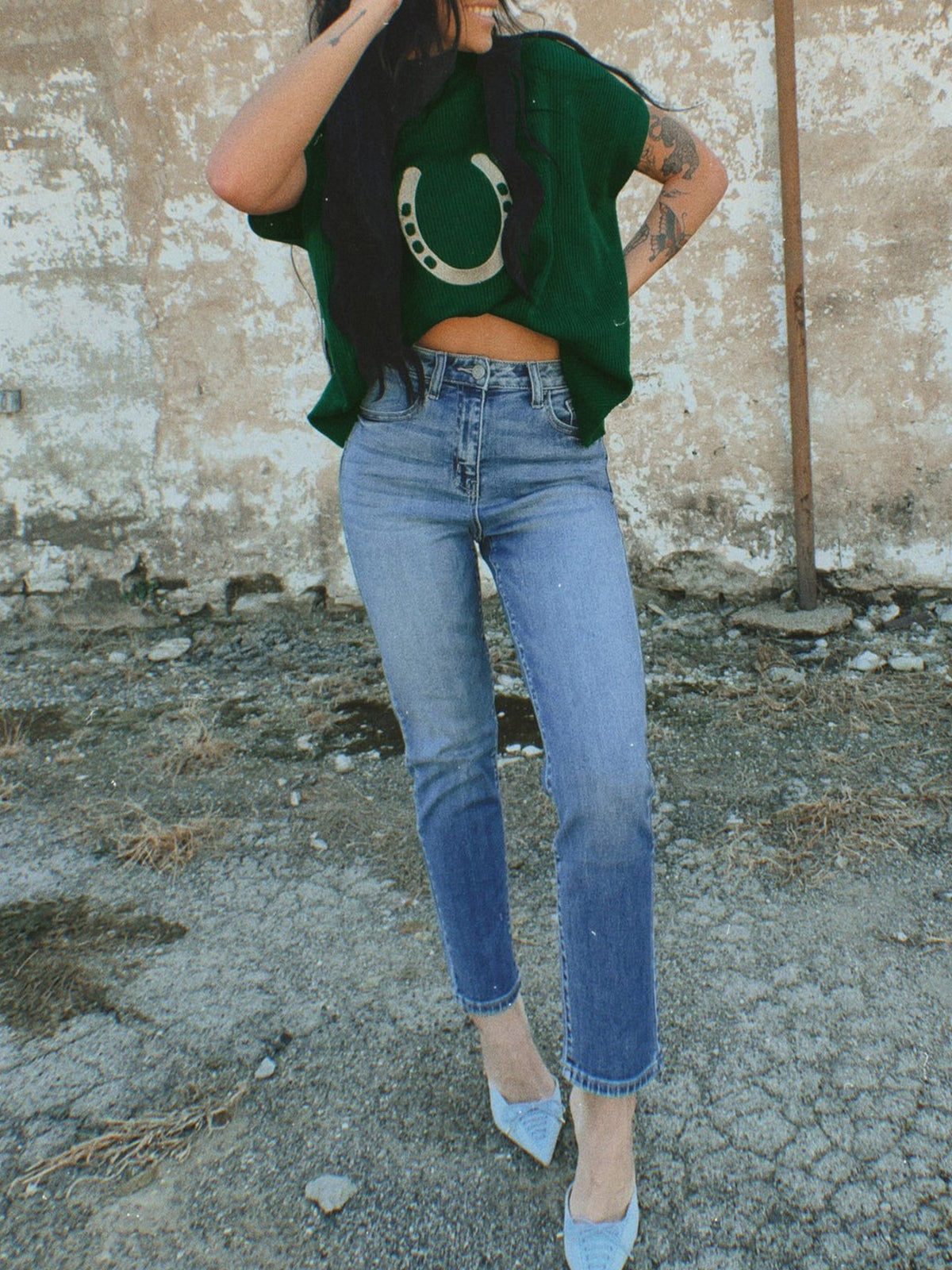 Horseshoe graphic knit sweater detail in dark green