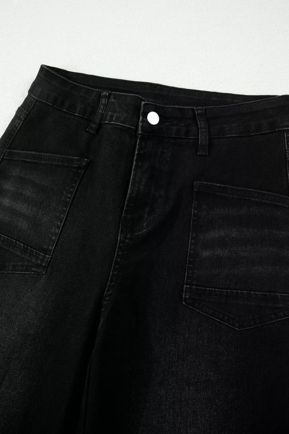 Cropped black jeans side view