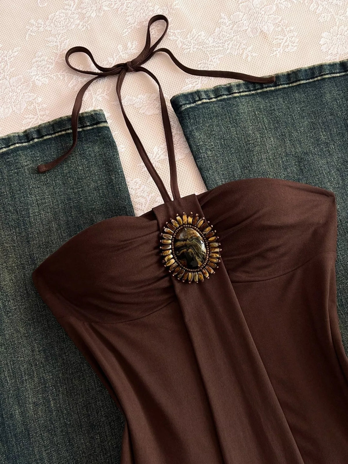 Three quarter view of the halter neck cami