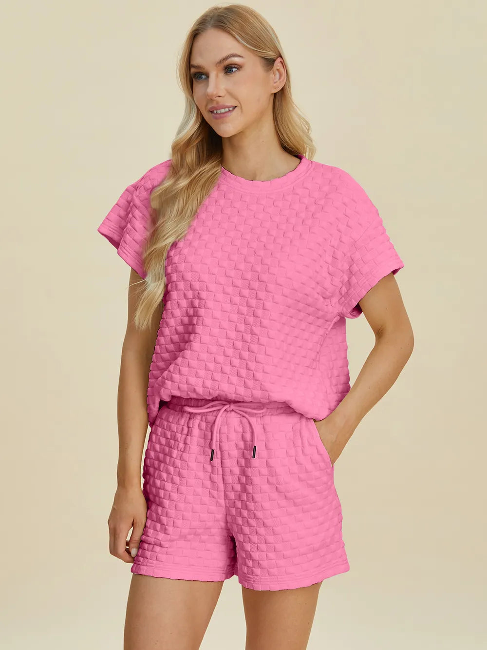Pink colorway of the tee and shorts set