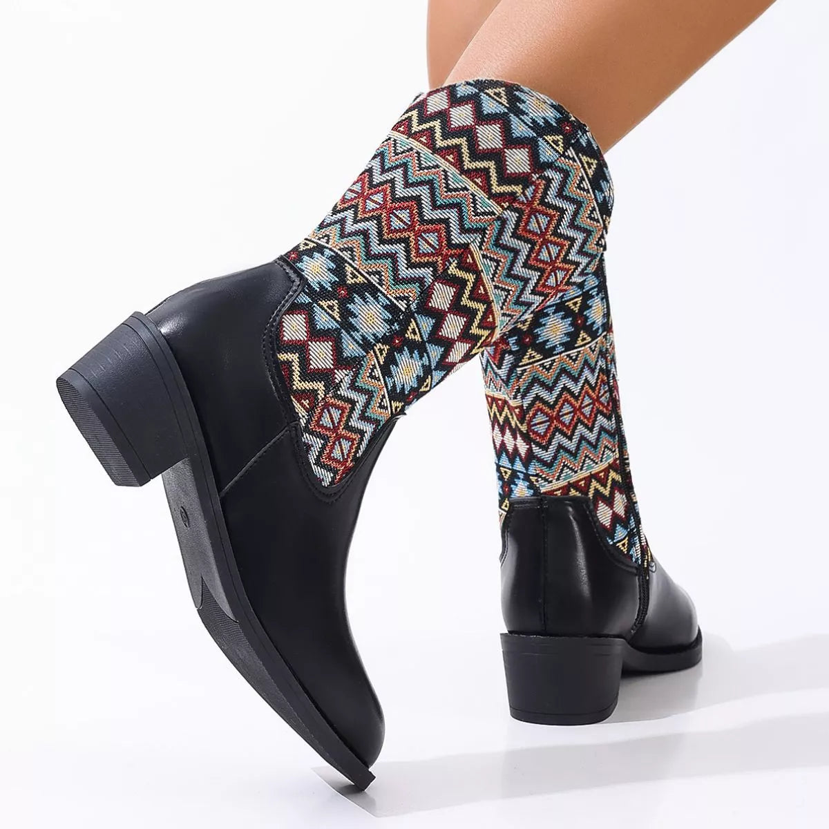 Point toe block heel boots detail of the trim