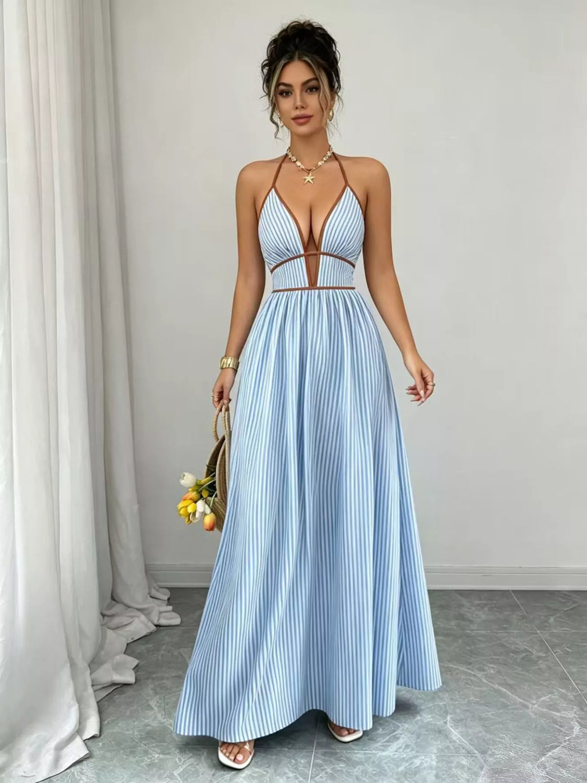 Light blue striped maxi dress tie back view