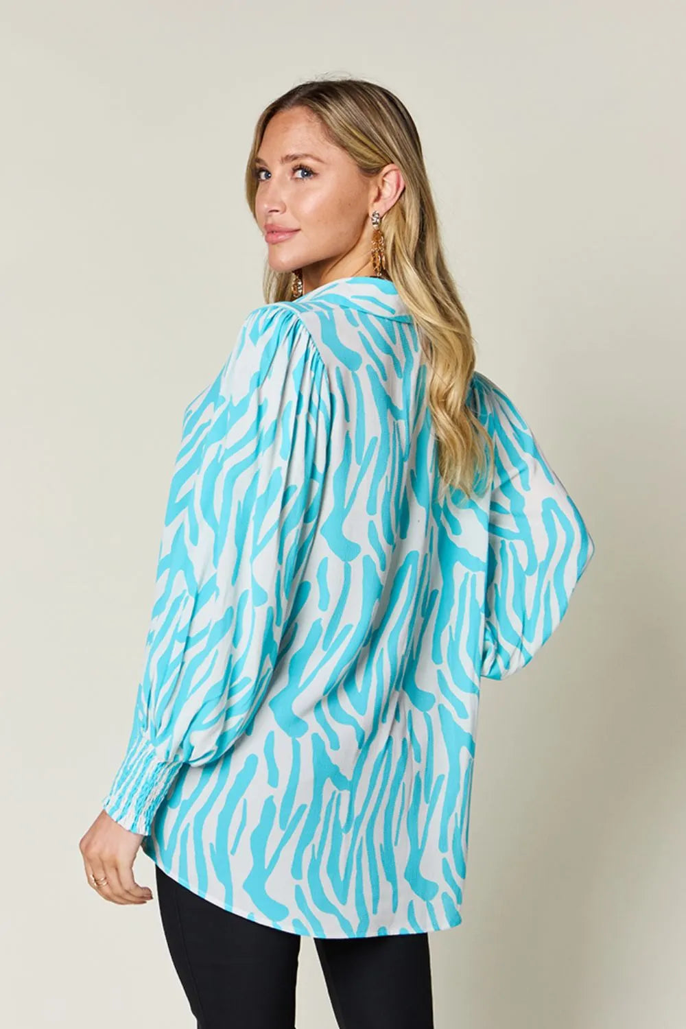 Hem detail of the smocked blouse