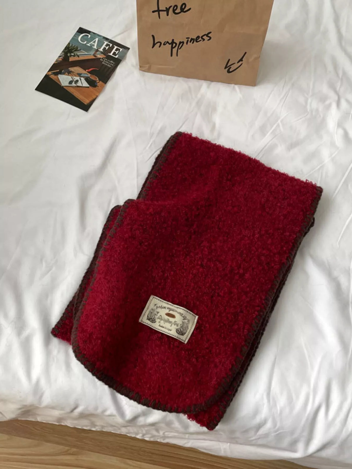 Plush winter scarf styled over a coat