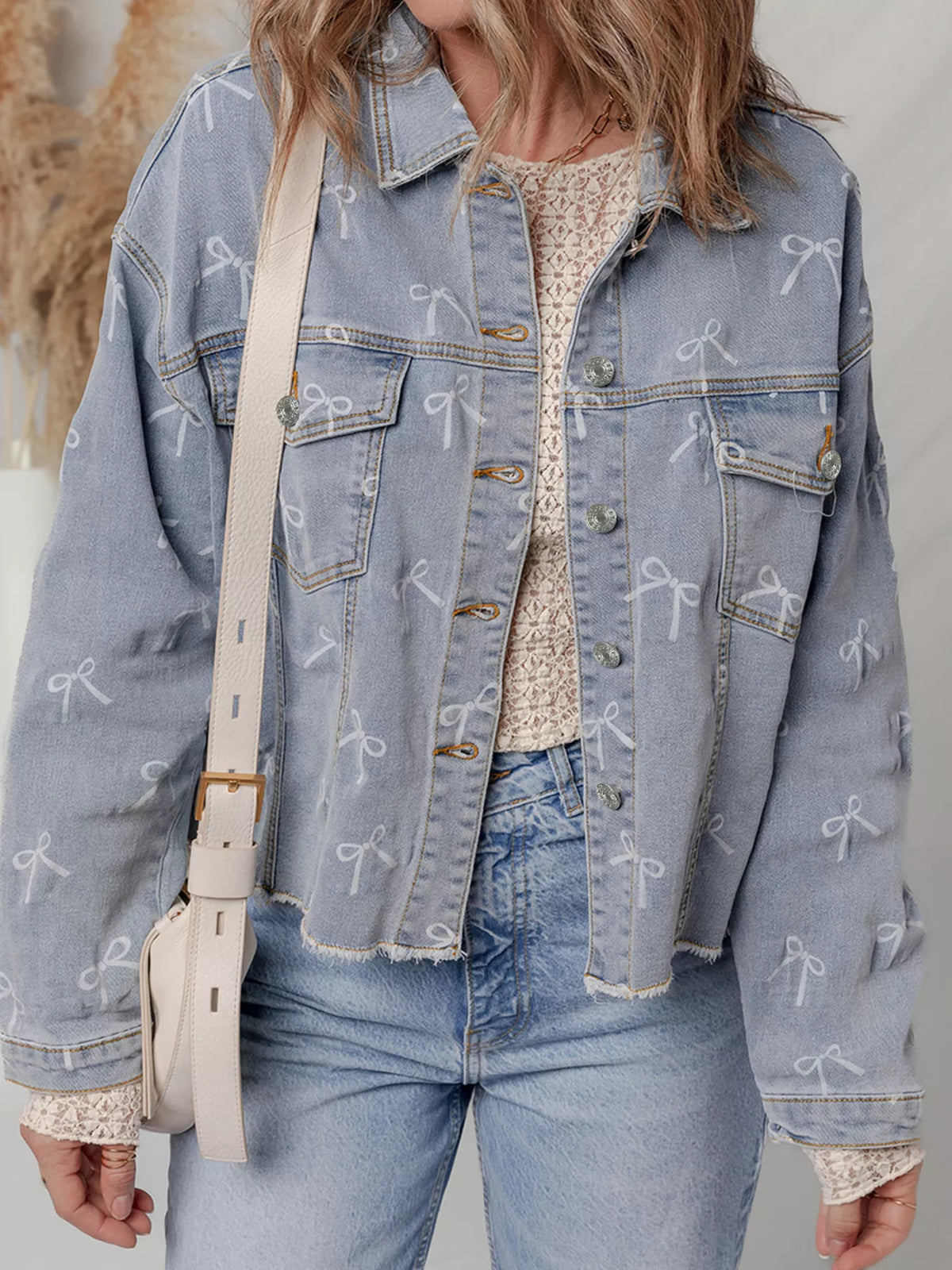 Bow Print Raw Hem Denim Jacket in Light Wash