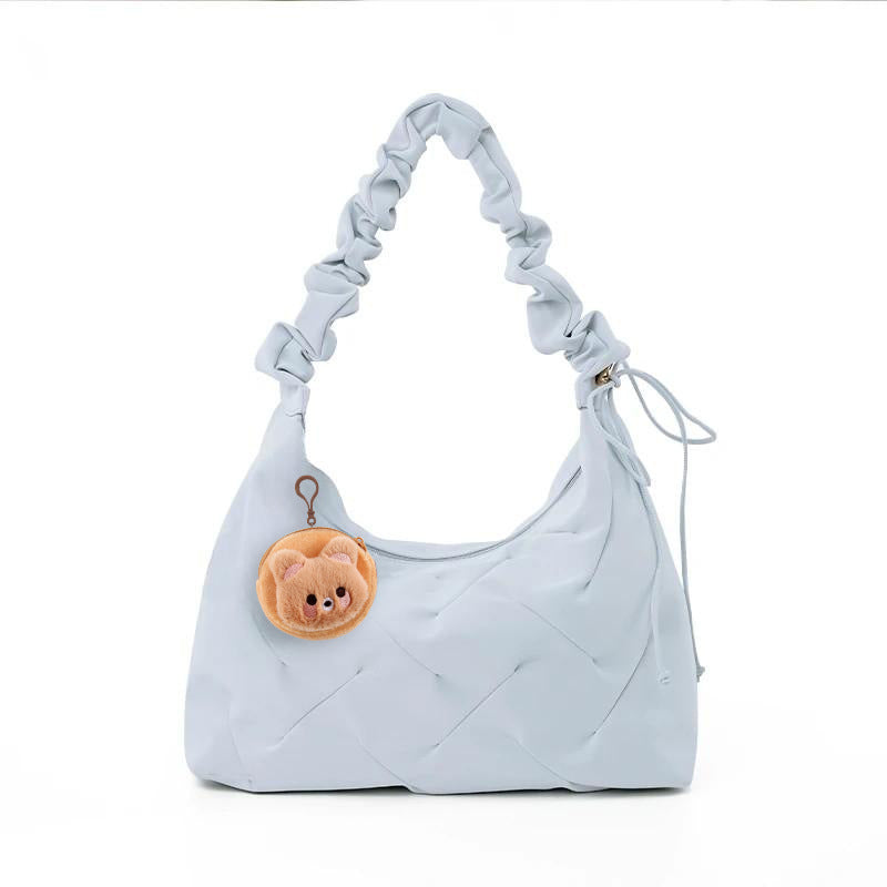 Ruched handle shoulder bag in light blue front view