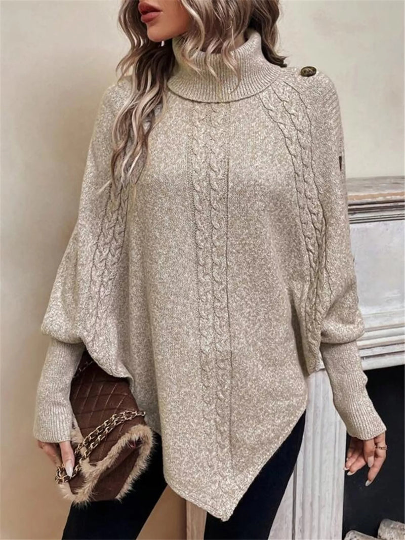 Cable knit turtleneck cape sweater front view