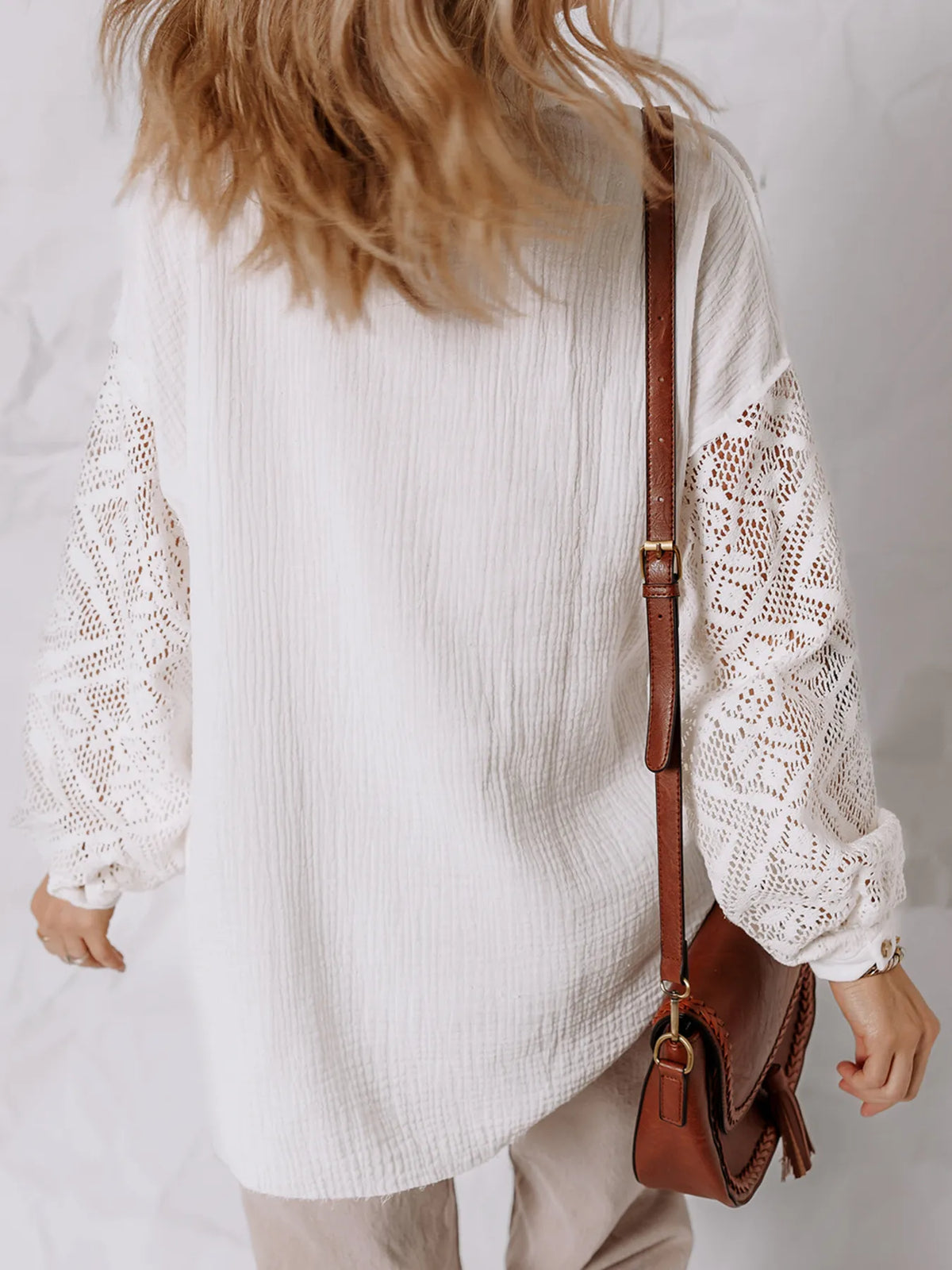 Lace sleeve button down top styled with jeans