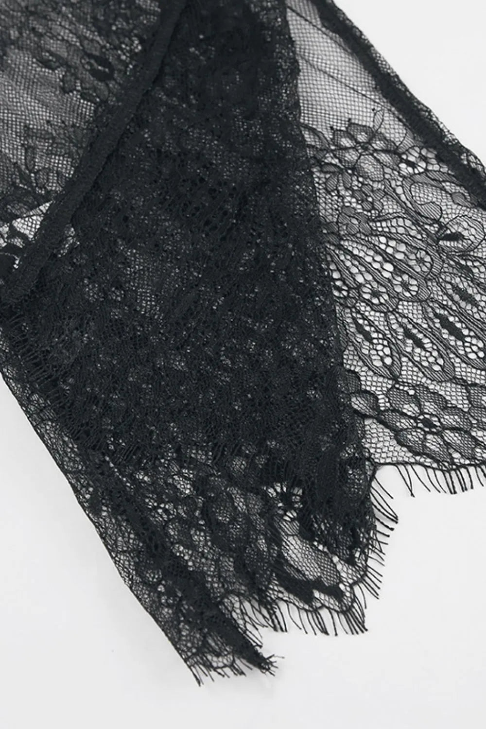 Fringe lace top brocade pattern close up