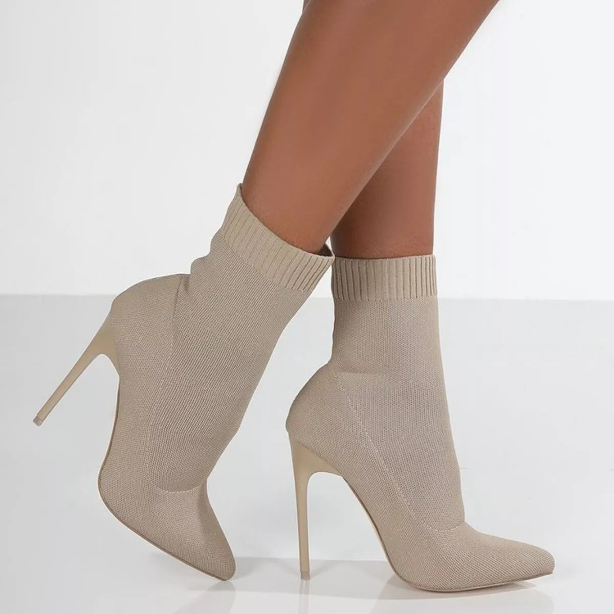 Point toe stiletto boots angled pair
