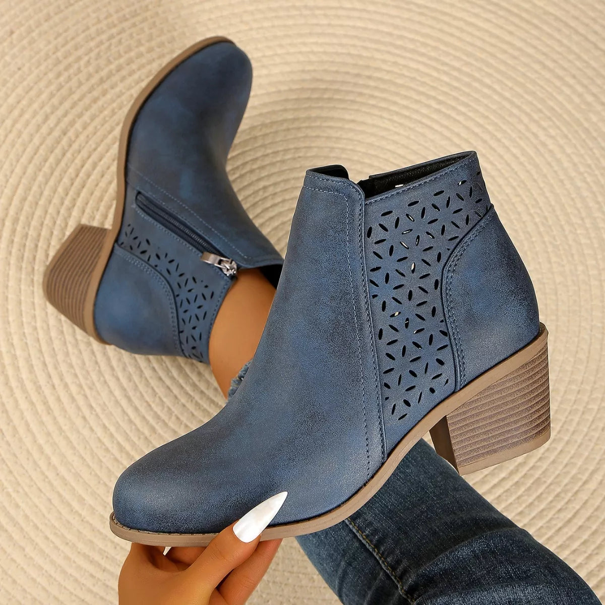 Point toe block heel boots side view of the shaft