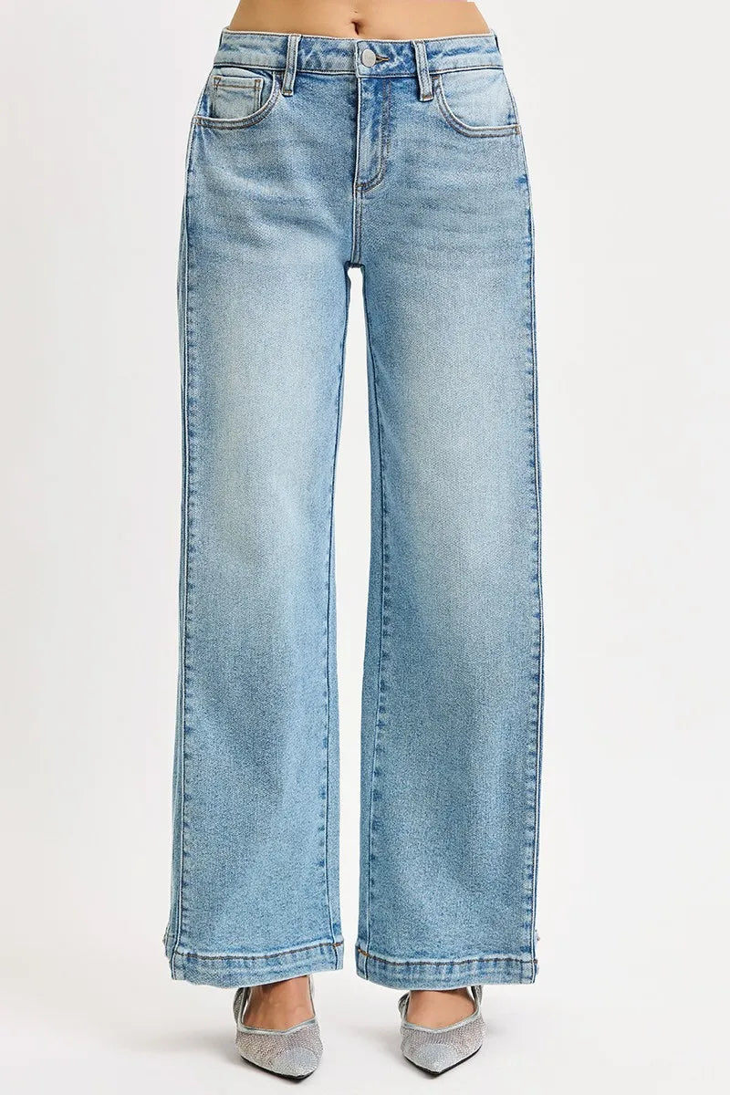 RISEN snap hem jeans back view with five pocket styling