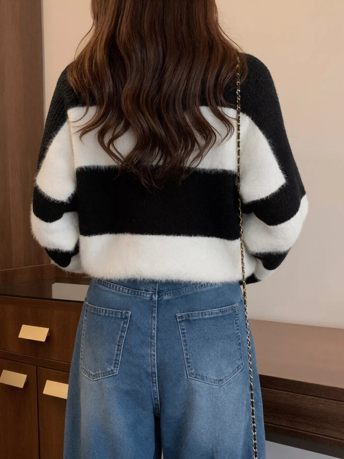color block drop shoulder sweater close up detail