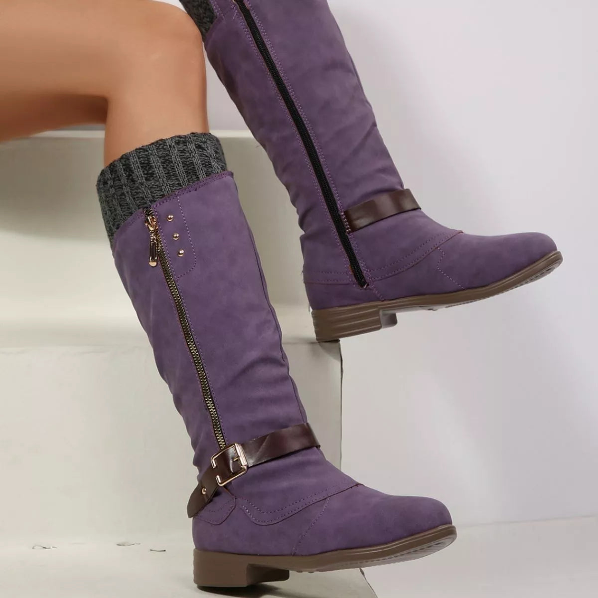 Black round toe block heels boots angled three quarter view