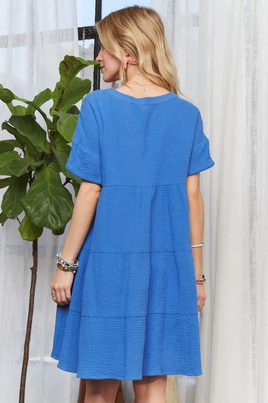 Notched neck tiered dress detail and hem