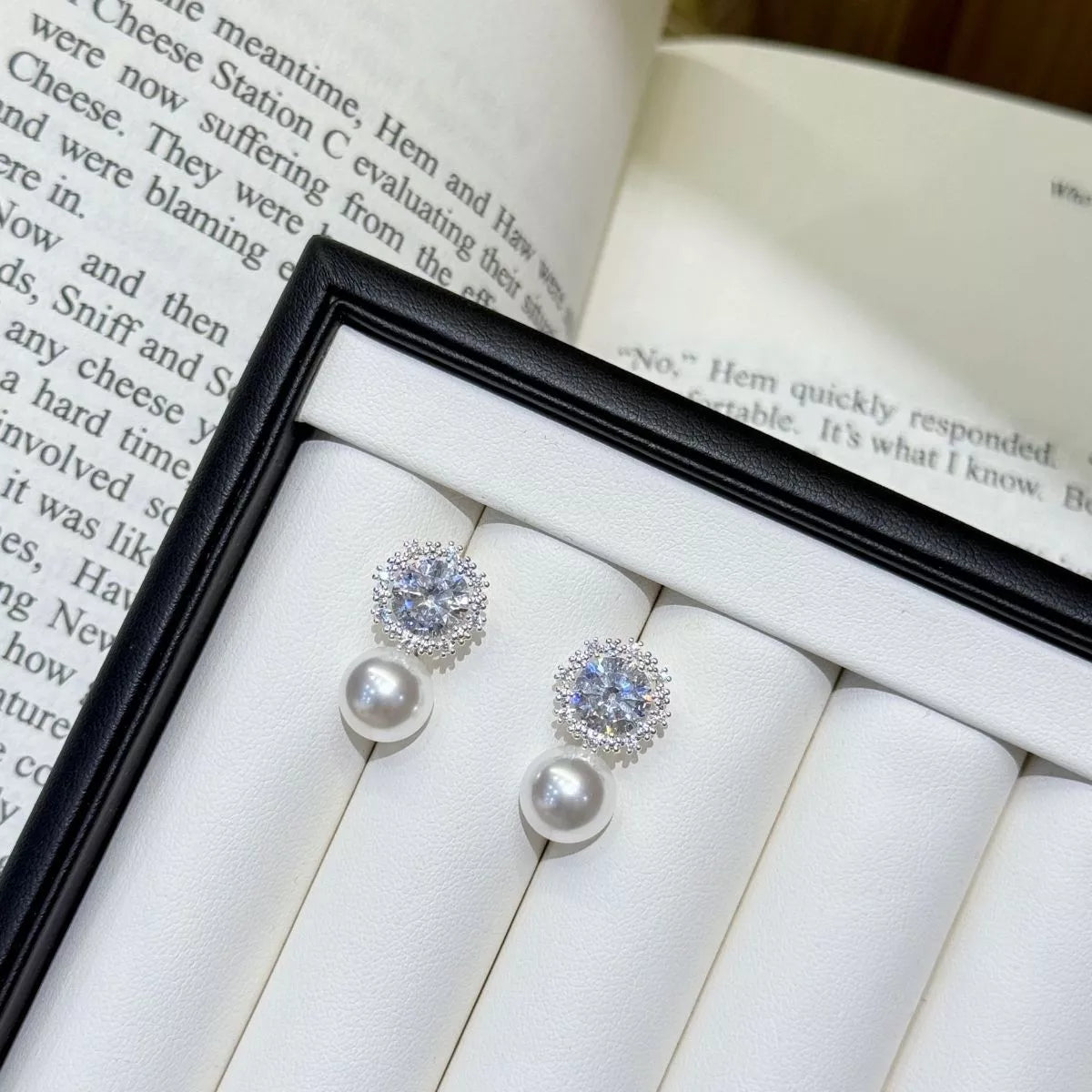 Silver pearl and zircon drop earrings front view