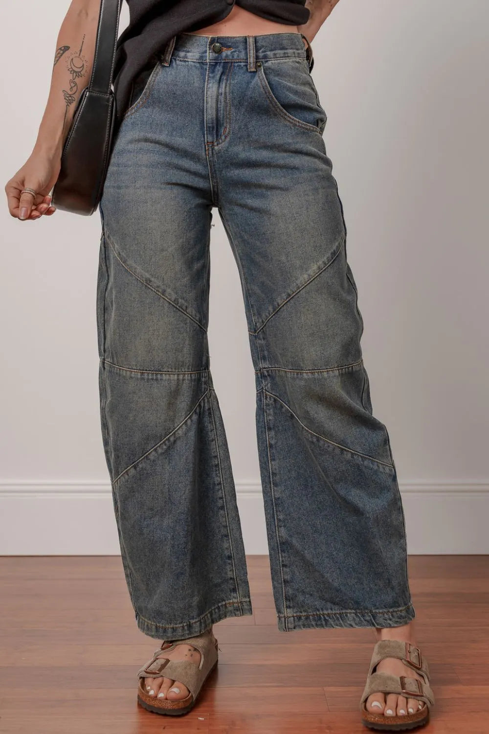 Dark navy straight leg denim jeans side view