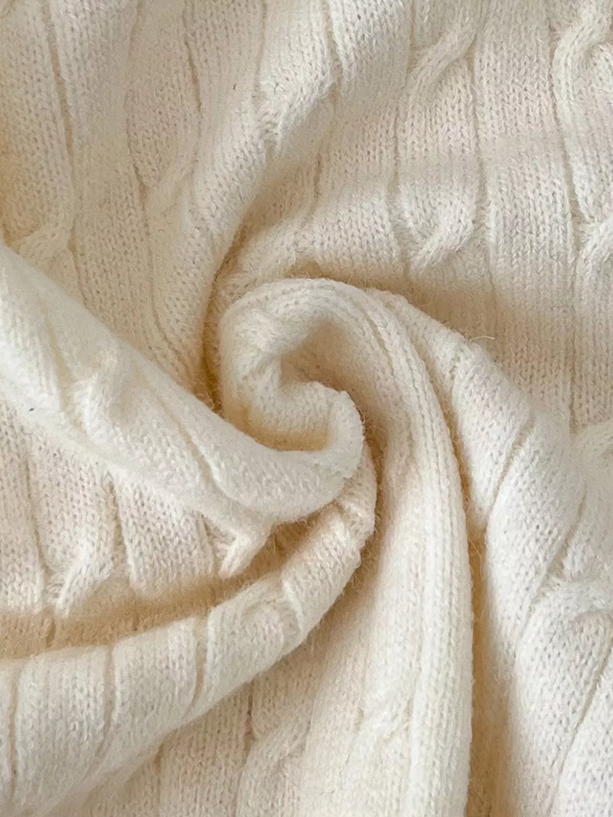 Texture knit cardigan worn open layering