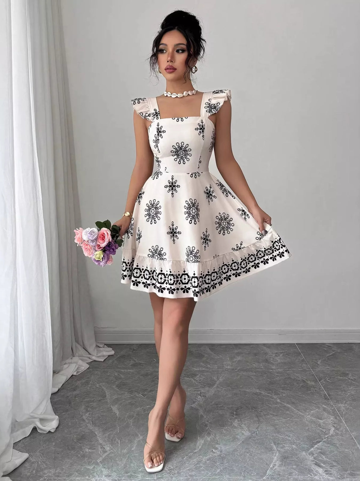 Ruffle detailing on the printed mini dress