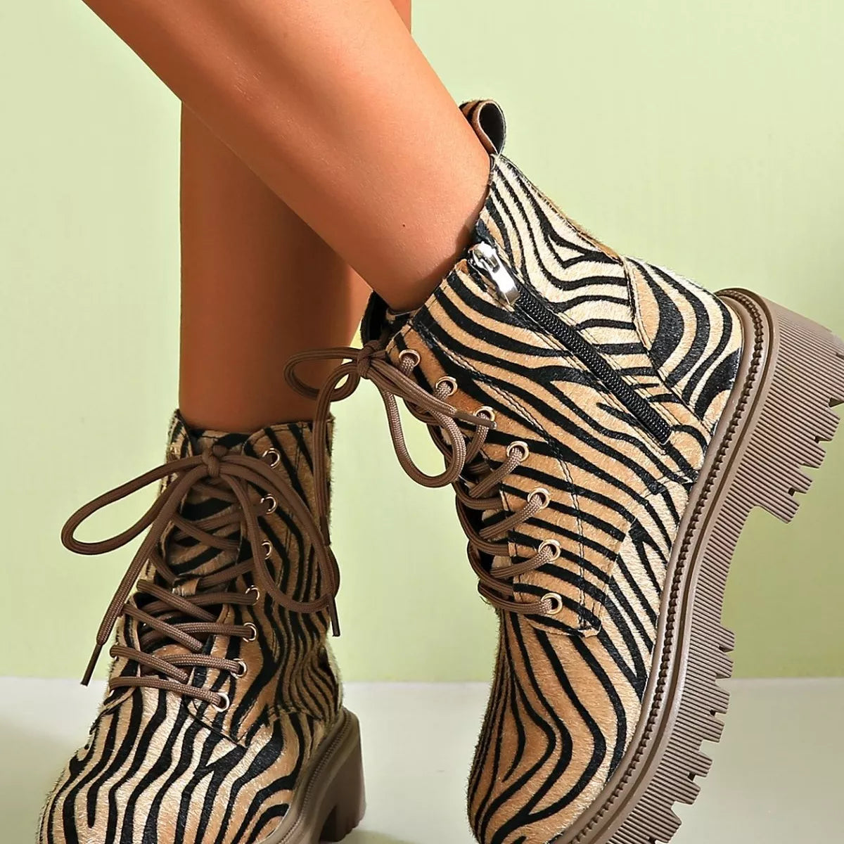 Animal print lace up ankle boots three quarter angle