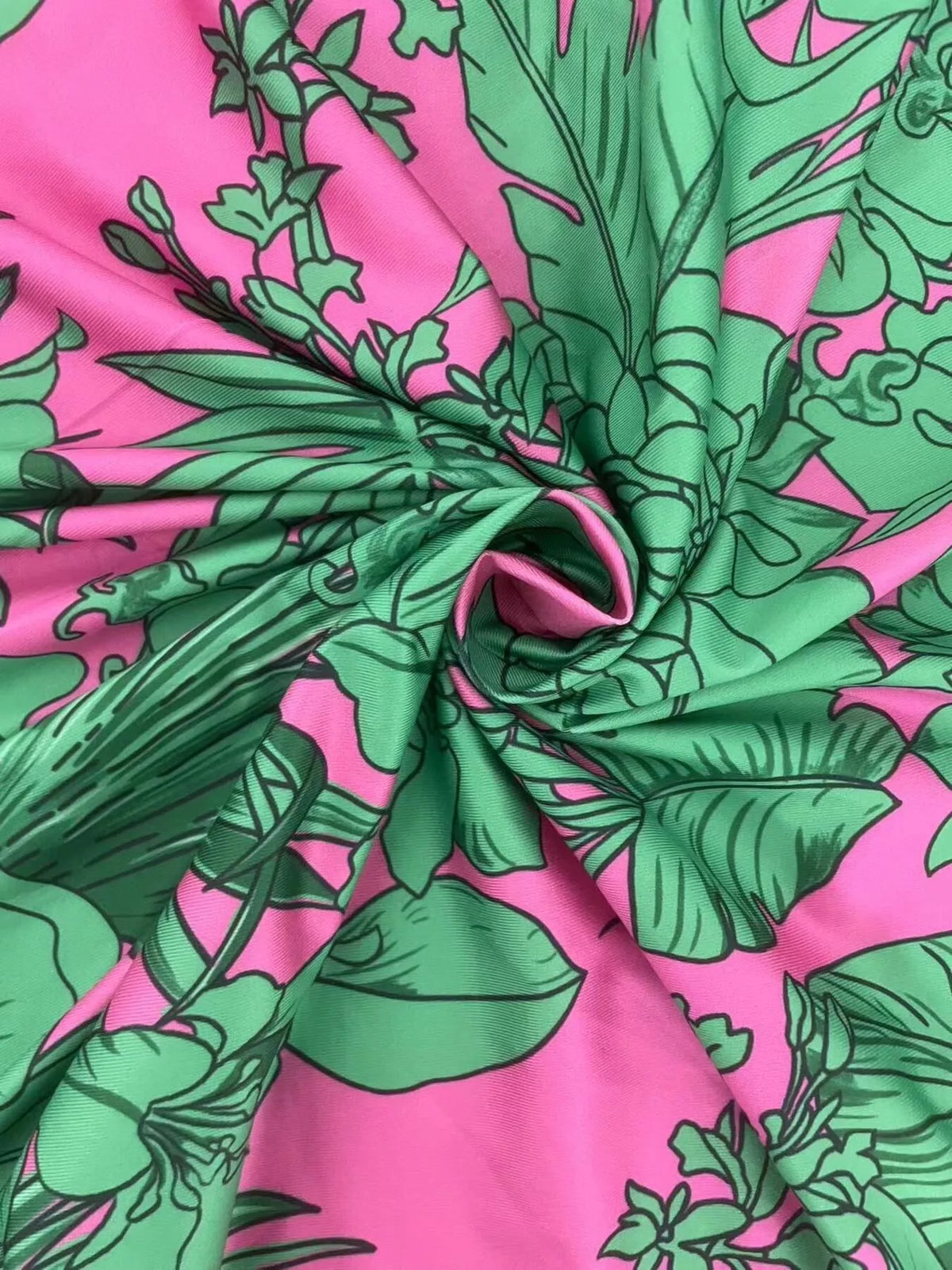 Halter neckline detail on the green printed dress